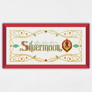 Puede incluir: Un diseño de punto de cruz enmarcado con un esquema de color dorado y blanco. El diseño presenta un escudo estilizado con un pájaro rojo y el texto "Aru belore dela'na Silvermoon".