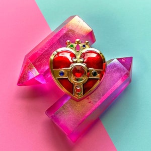 Pin compacto de corazón cósmico