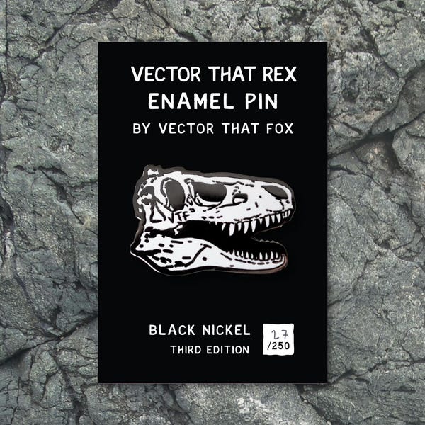 Pin de esmalte duro con forma de calavera de dinosaurio 'VECTOR THAT REX', de Vector That Fox