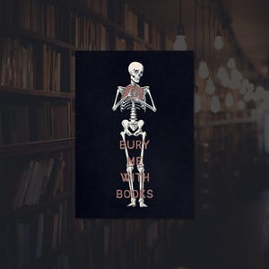 May include: A black and white skeleton holding a book to its chest. The text "BURY ME WITH BOOKS" is written below the skeleton.