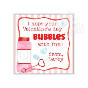 May include: A Valentine's Day-themed card with a pink bubble bottle illustration. The card features the text "I hope your Valentine's day BUBBLES with fun!" and "from, Darby."