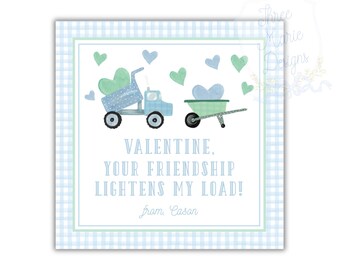 May include: A square Valentine's Day card with a blue and white gingham border. The card features a blue truck and a green wheelbarrow, each carrying heart-shaped objects. Text reads: "VALENTINE, YOUR FRIENDSHIP LIGHTENS MY LOAD!" and "from Cason."