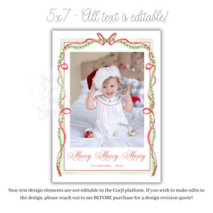 May include: A holiday card with a photo of a baby wearing a Santa hat and a white dress. The card has a red and green border with the text "Merry, Merry, Merry" and "THE FREEMANS - 2025". The card is 5x7 inches.