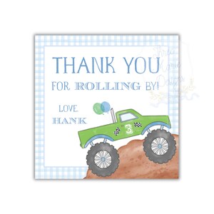 May include: Thank you for rolling by!  A green monster truck with the number 3 on the side is driving up a dirt hill.  The truck has blue wheels and a blue and green balloon is floating above it.  The text "Love, Hank" is below the truck.
