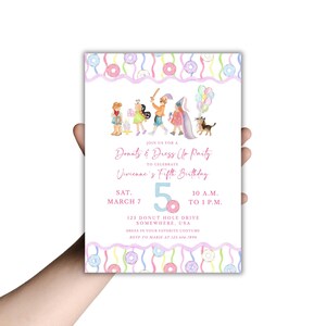 May include: A party invitation with a watercolor design. The invitation reads "Donuts & Dress Up Party" to celebrate Vivienne's Fifth Birthday. The design includes illustrations of costumed figures, donuts, and colorful ribbons. The date is March 7.