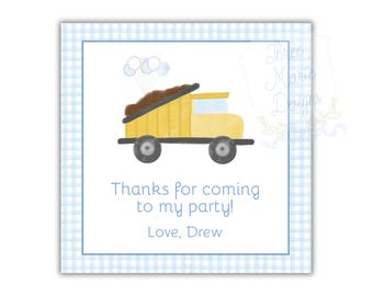 May include: A blue and white gingham thank you card featuring a yellow dumper truck carrying brown dirt. The truck has blue wheels and is decorated with white balloons. The text on the card reads "Thanks for coming to my party! Love, Drew."