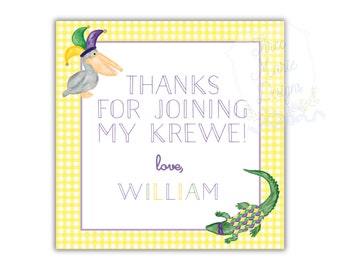 May include: A yellow and white gingham patterned thank you card with a purple border. The card features a cartoon pelican wearing a purple and green jester hat and a green alligator with a purple and green patterned design. The text on the card reads "Thanks for joining my Krewe! love, William".