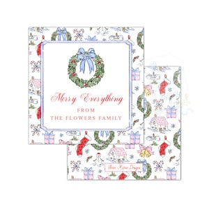 May include: Christmas-themed gift tags with a watercolor design. The tags feature a wreath with a blue bow, the text "Merry Everything From The Flowers Family", and a pattern of holiday elements like houses, stockings, and gifts.