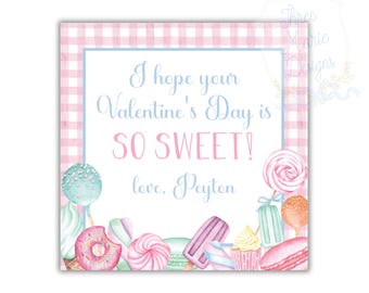 May include: A square Valentine's Day card with a pink and white gingham border. The card features the text "I hope your Valentine's Day is SO SWEET!" in blue and pink. Watercolor illustrations of sweets, including lollipops, donuts, and macarons, surround the text.