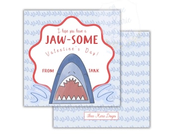 May include: Valentine's Day card with a shark design. The card features a blue shark with an open mouth, red teeth, and the text "I hope you have a JAW-SOME Valentine's Day!" on a light blue background.