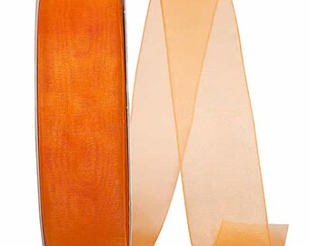 May include: Two spools of orange sheer ribbon. One spool is a darker orange and the other is a lighter orange.