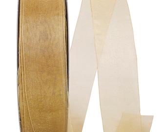May include: A roll of gold sheer ribbon with a shimmery finish. The ribbon is rolled on a spool and is ready to be used for crafting, decorating, or gift wrapping.