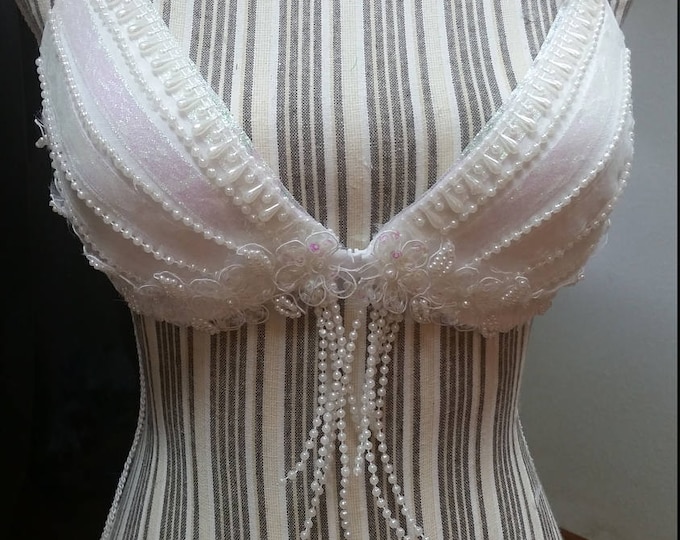 White bedazzled opalescet bra.