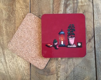 Diep rood glanzend coaster met illustratie van planten kaarsen en boeken