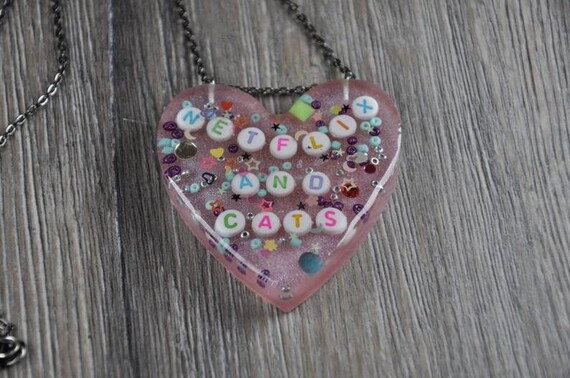Handmade kawaii epoxy resin heart necklaces.