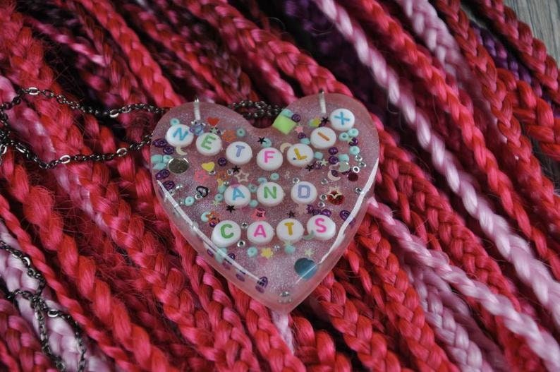 Handmade kawaii epoxy resin heart necklaces.