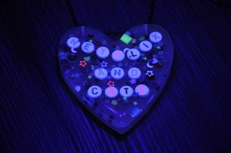 Handmade kawaii epoxy resin heart necklaces.