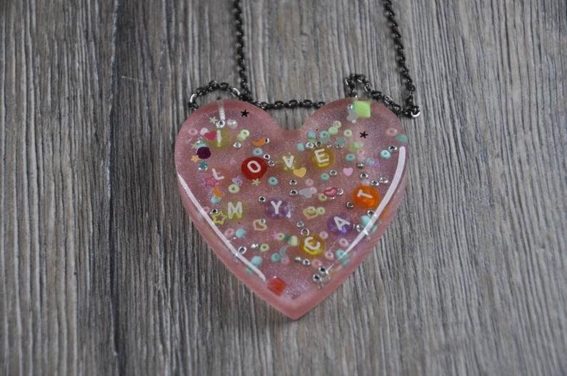 Handmade kawaii epoxy resin heart necklaces.