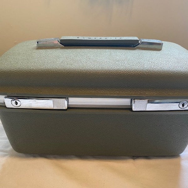 Green Samsonite Travel Case