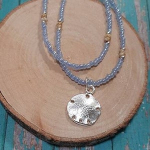 Sand Dollar Dainty necklace/Double Strand Seed bead/Sand dollar charm, Greek Metal Casting
