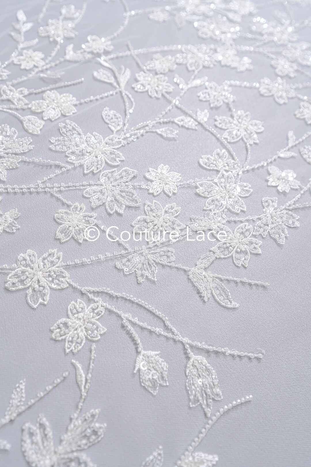 LL-1445, Lovely beaded lace fabric with wave design in off-white color