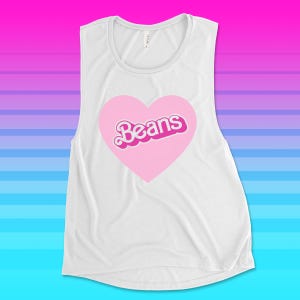 May include: White vest top with a pink heart design. The heart contains the word "Beans" in a retro, cursive font. The top is made of a soft material and is suitable for casual wear.