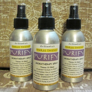 May include: Three silver spray bottles with black tops and labels that read "ExiScentials" "Three Thieves" and "Purify"  "Aromatherapy Spray"  "Thieves Oil Blend"  "An ancient formula to purify...damp paper towel to use on surfaces etc. INGREDIENTS: eucalyptus, cinnamon, clove, rosemary, thyme & purified...