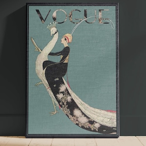 May include: A framed vintage Vogue magazine cover featuring a woman riding a peacock. The artwork has a teal background with the word "VOGUE" at the top. The woman is wearing a black dress and a gold headpiece. The peacock is white with a long, flowing tail.