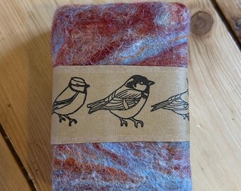 Patchouli & Sandalwood soap, felted with merino wool and tussah silk.