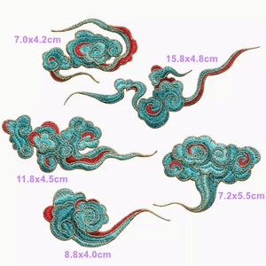 May include: Five turquoise and red embroidered cloud patches with gold accents. The patches are various sizes, ranging from 7.0x4.2 cm to 15.8x4.8 cm.