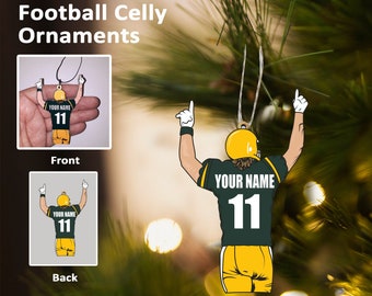 May include: Green and yellow football player Christmas ornament with the text "YOUR NAME 11" on the back.