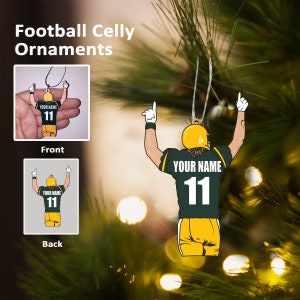 May include: Green and yellow football player Christmas ornament with the text "YOUR NAME 11" on the back.