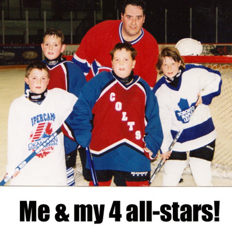 May include: A group of five young hockey players, including a coach, pose for a photo. The players are wearing hockey jerseys with team logos and holding hockey sticks. The coach is wearing a red jersey with a team logo. The photo is captioned "Me & my 4 all-stars!"