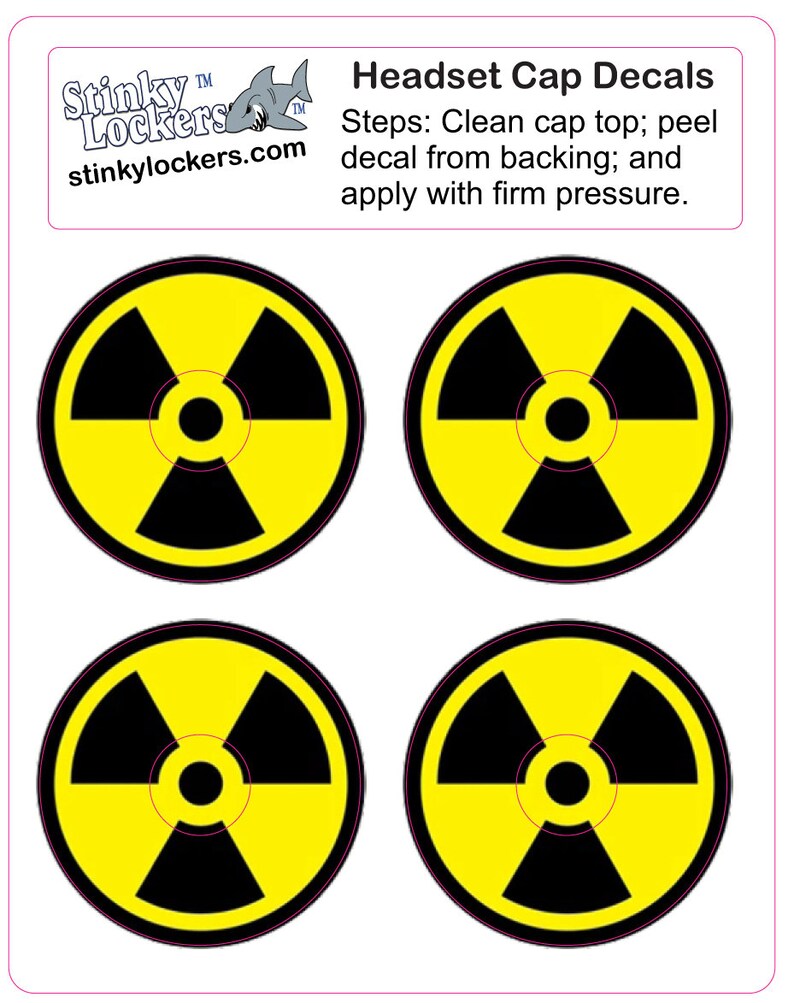 May include: Four yellow and black radiation symbol stickers. The stickers are round and have a black radiation symbol on a yellow background. The text "Headset Cap Decals" is at the top of the image. The text "Steps: Clean cap top; peel decal from backing; and apply with firm pressure." is below the title.