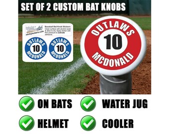 May include: Set of two custom baseball bat knobs with a red and white sticker that says "OUTLAWS 10 MCDONALD". The stickers are designed to be placed on bats, water jugs, helmets, and coolers.