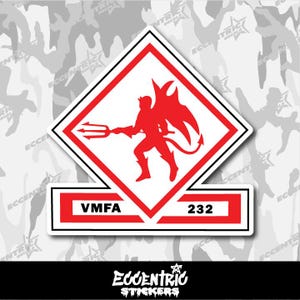 May include: A red and white decal featuring a devil figure with a trident inside a diamond shape. The text "VMFA 232" is displayed below. The decal is from Eccentric Stickers.