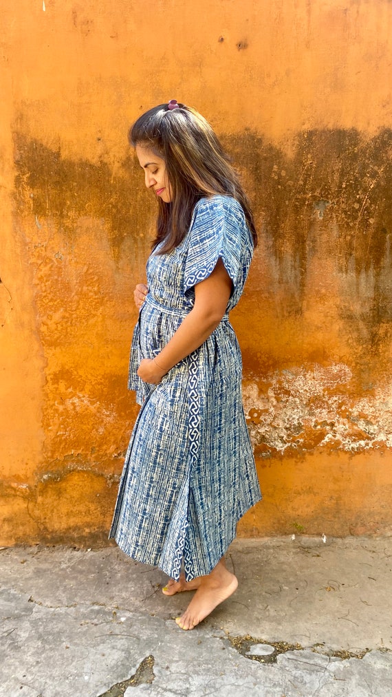 Mother Postpartum Wearing Hospital Gown Robe Stands Frontal Staring Blankly  Stock Photo by ©Jkirsch13 330209560