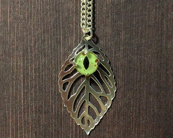 Glass Taxidermy Eye Necklace on Leaf