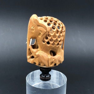 Custom Lamp Final Featuring a Carved Elephant with a Baby Elephant Inside.