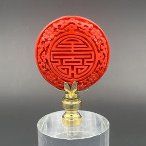 Custom Lamp Finial Featuring a hand carved disk of Chinese Red Cinabar