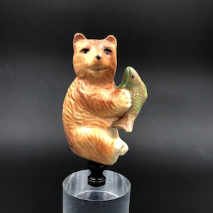 Custom Lamp Finial Featuring a Russet Colored Bear Holding A Green Fish
