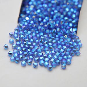 Swarovski Sapphire 2X AB Bicone Beads, 3/4mm Jewelry Making Crystals
