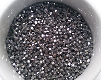 Cuentas bicónicas Swarovski de 3 mm, color gris plomo metalizado, para la elaboración de joyas