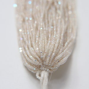 11/0 Charlotte Cut Seed Beads, Patina White Alabaster Aurore Boreale