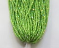 11/0 Hanks Charlotte Cut Beads Opaque Lime Aurore Boreale 1/5/25/50/100 Hanks PREMIUM SEED BEADS, Native Supplie product logo