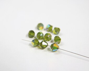 8 MM Olivine Aurore Boreale Vintage Swarovski Doppelkegel Perlen