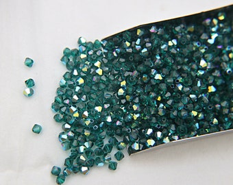 Cuentas bicónicas Swarovski Emerald AB, para fabricación de joyas (3/4 mm)