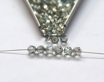 Cuentas redondas facetadas de Swarovski en tono azul cristal de 6 mm, artículo 5000