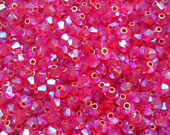 Cuentas bicónicas Swarovski Hyacinth AB (3/4 mm)