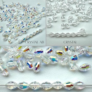 May include: An assortment of clear crystal beads, including Crystal AB and Swarovski, displayed in a collage. The beads are faceted and reflect light, creating a sparkling effect. Some beads are strung on a wire, showcasing their shape and clarity. The text "CRYSTAL AB", "CRYSTAL", and "SWAROVSKI" are visible.